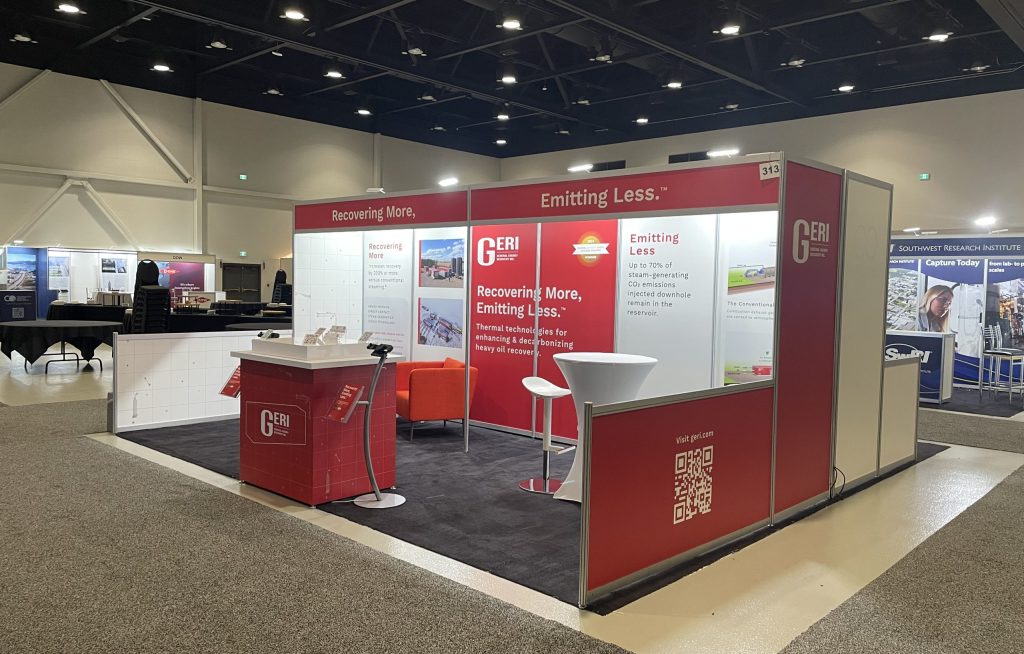 Custom trade show booth with hardwall panels and branded graphics